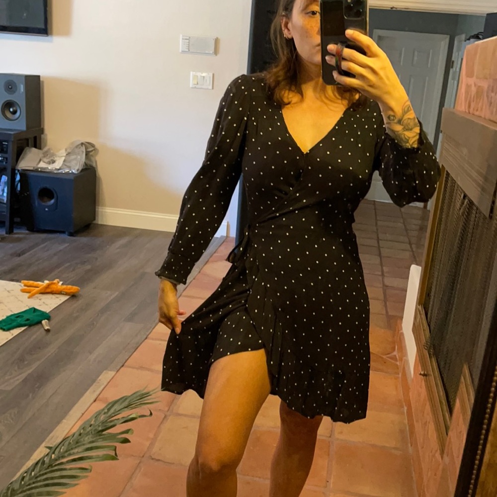 Flowy black polka dot wrap dress